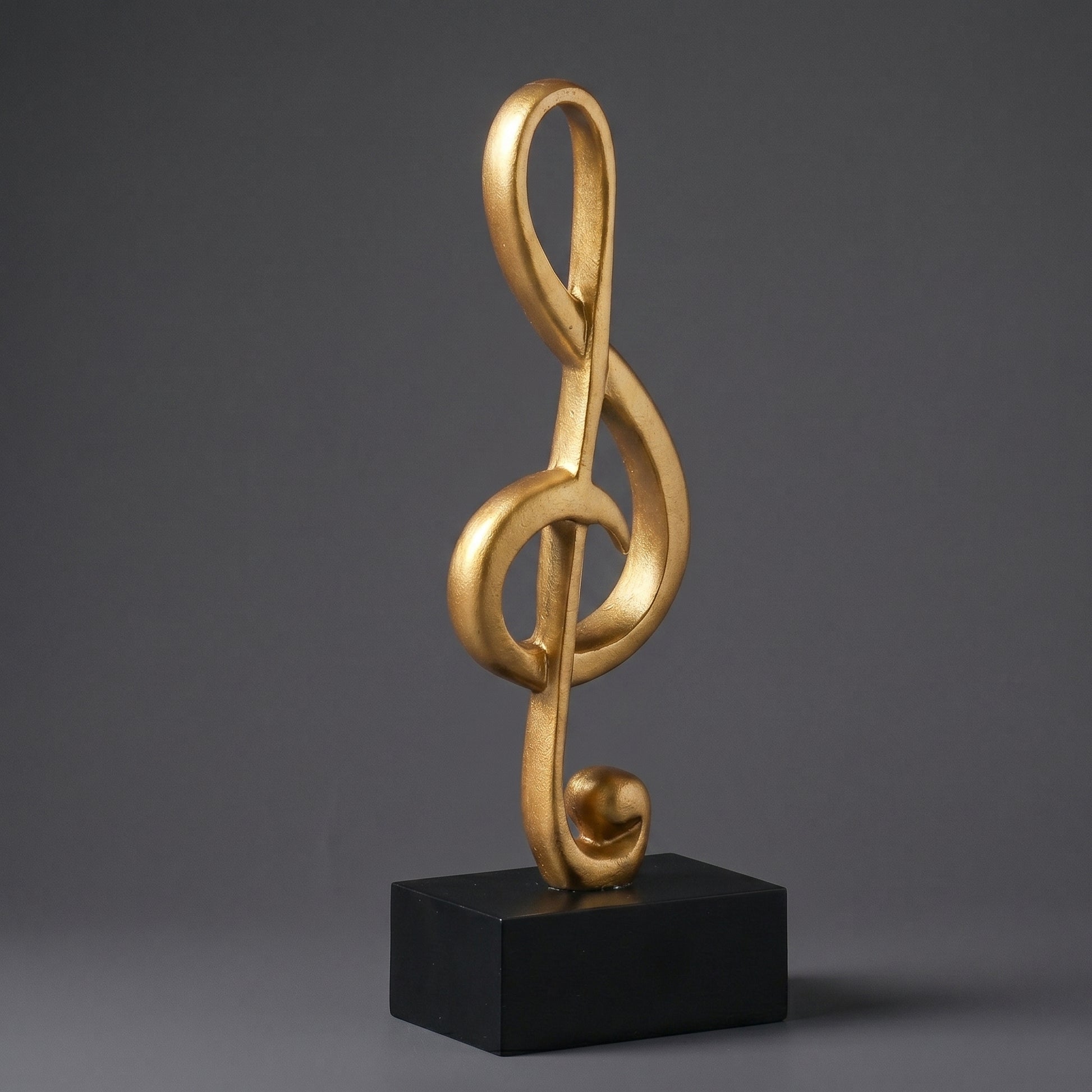Escultura Clave de Sol Decorativa em Resina Dourada Símbolo Musical Moderno