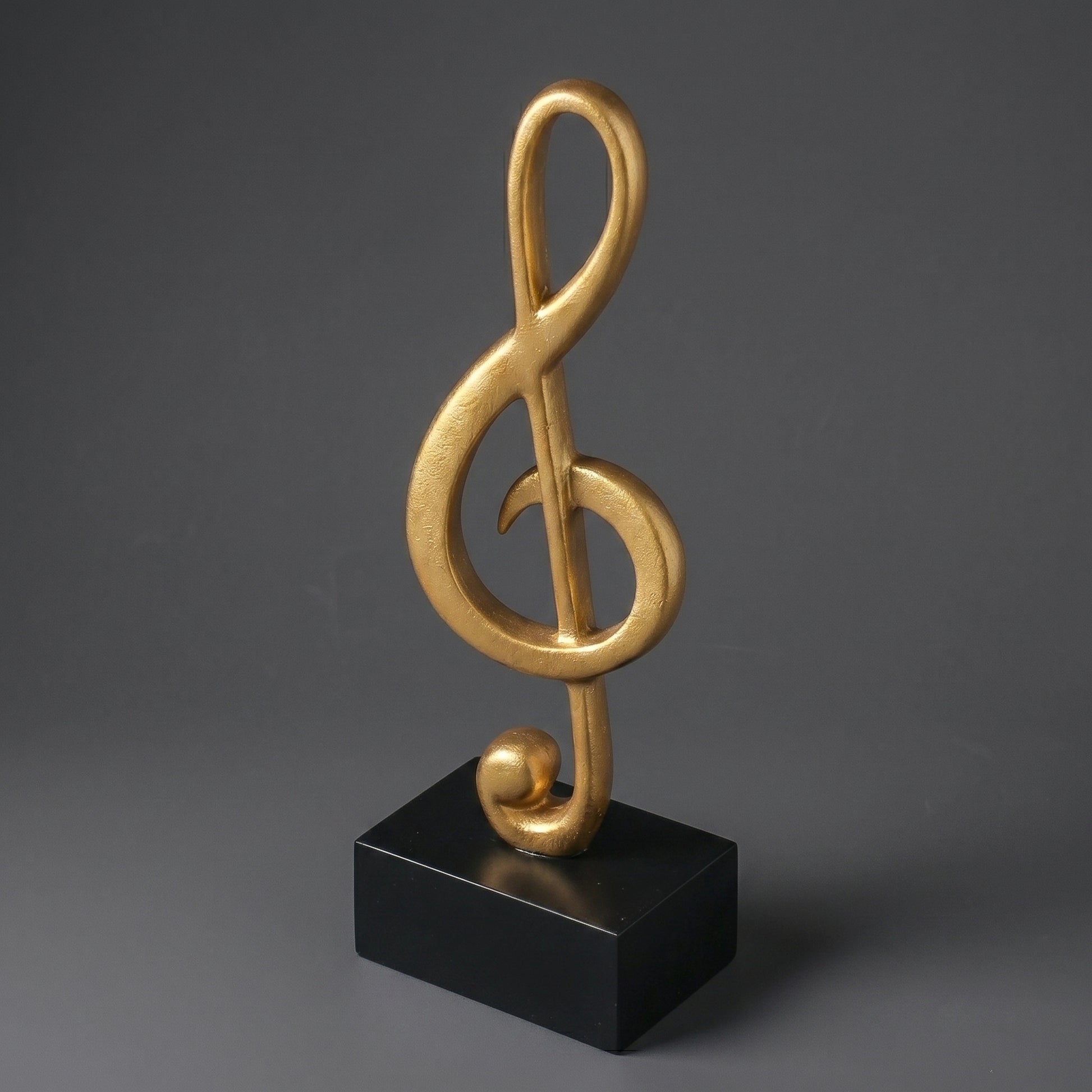 Escultura Clave de Sol Decorativa em Resina Dourada Símbolo Musical Moderno
